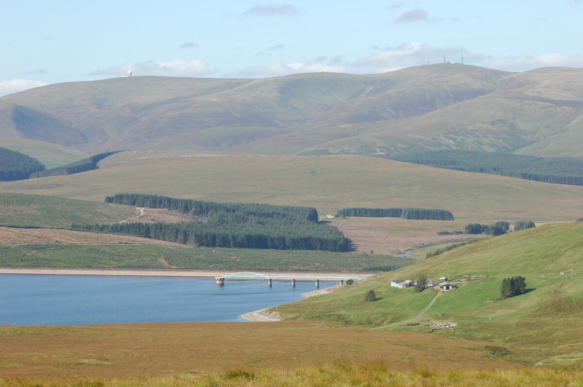 A landscape of fields and water in Dumfries and Galloway.